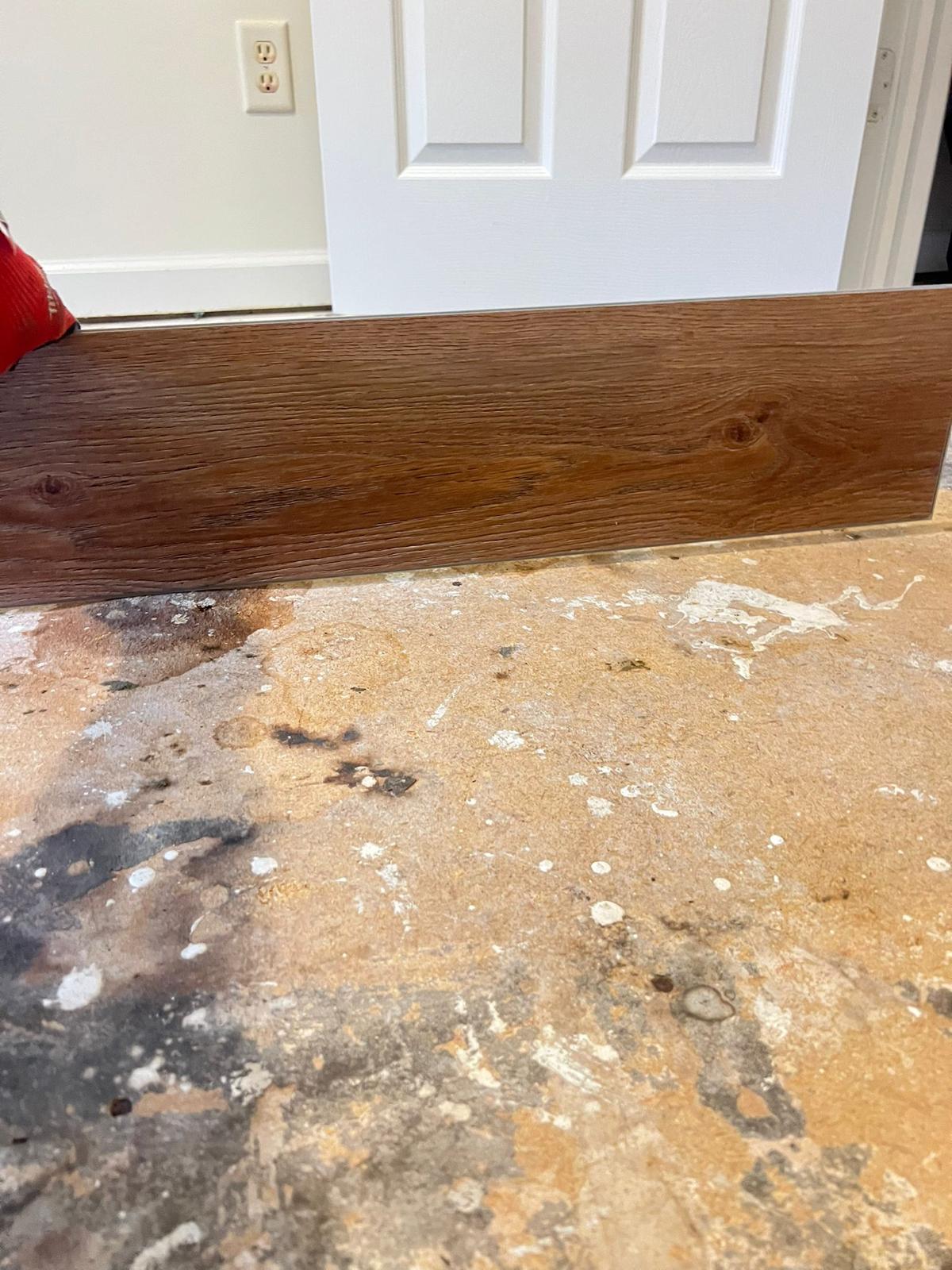 Close-up of the grain on a wood-look vinyl plank