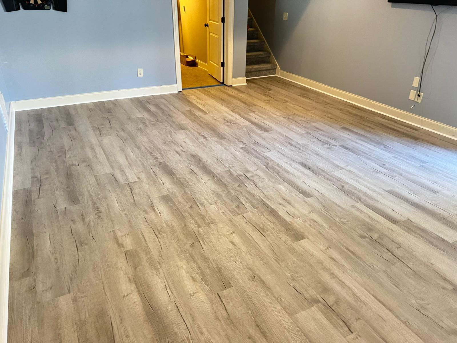 LVP vinyl flooring with a wood finish installed by ZAV Flooring in an Atlanta home