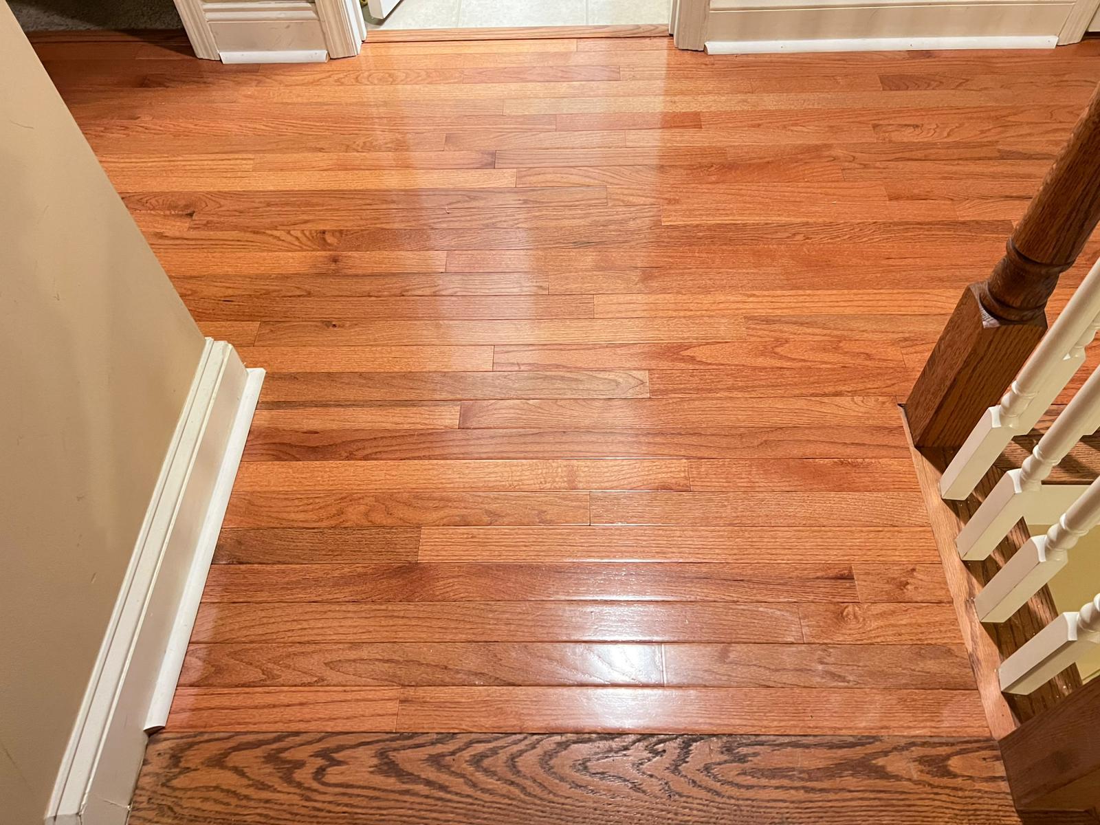 Oak floor next to a staircase