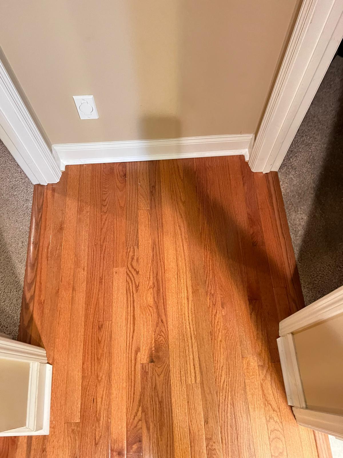 Oak floor transition between rooms